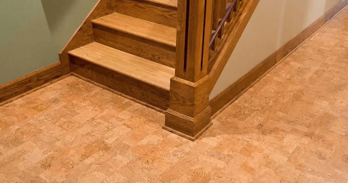 End of a staircase with cork flooring in Boulder, CO